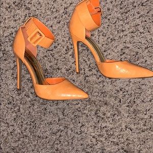Strapped orange heels